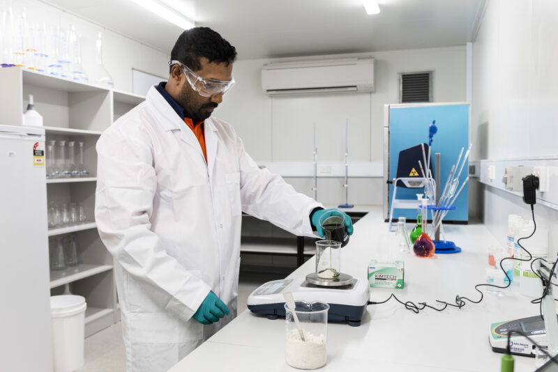 Image is of a scientist working in Sandy Ridge Labs- Tellus' innovation and research arm. Tellus is partnering with organisations such as entX to research waste to medicine initiatives.